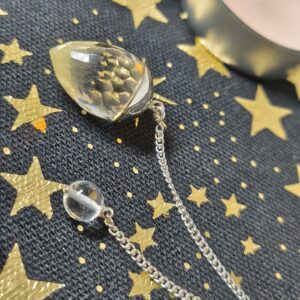 cristal de roche pendule goutte à facette / argent