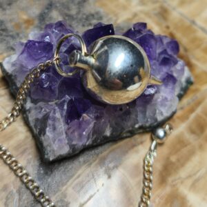 pendule goutte en metal