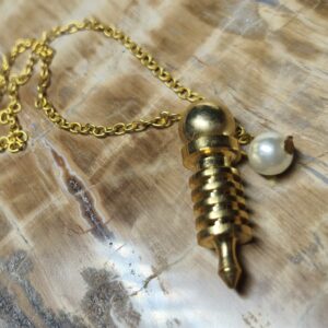 pendule pointe doré